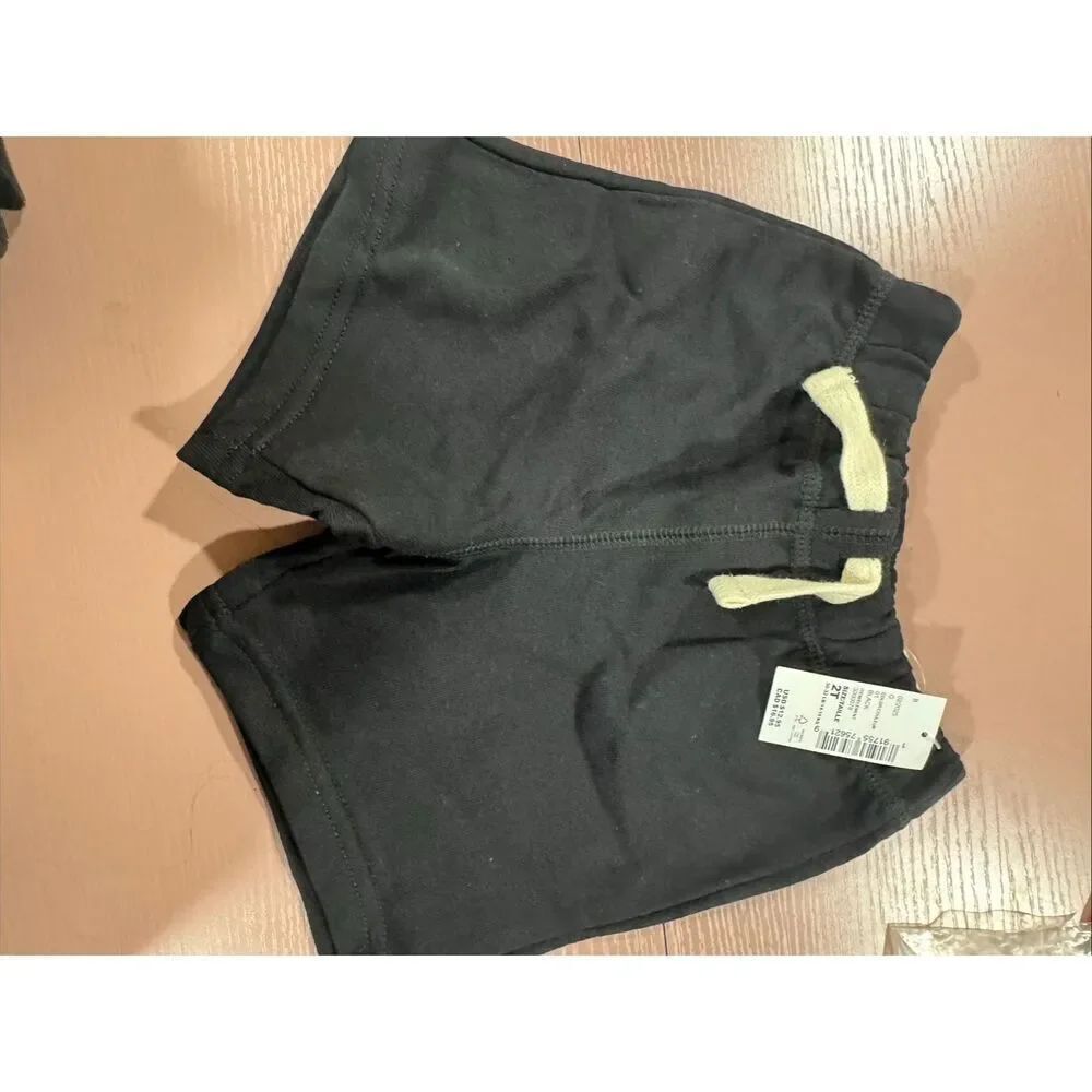 The childrenâs placeâ2t black shorts
